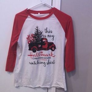 red and white long sleeve tee shirt with black and red lettering